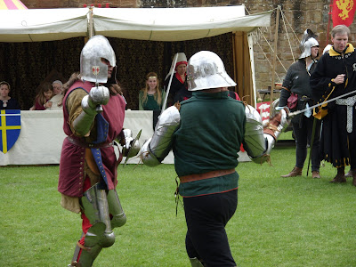 pictures of knights fighting. This included Knights fighting, Dacing & singing, archery demos & story 