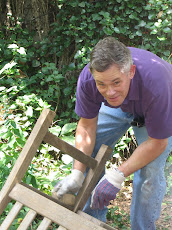 Dave Hall refinishing the bench