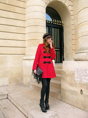 Louise Ebel, red military coat, fringe purse, feather headband