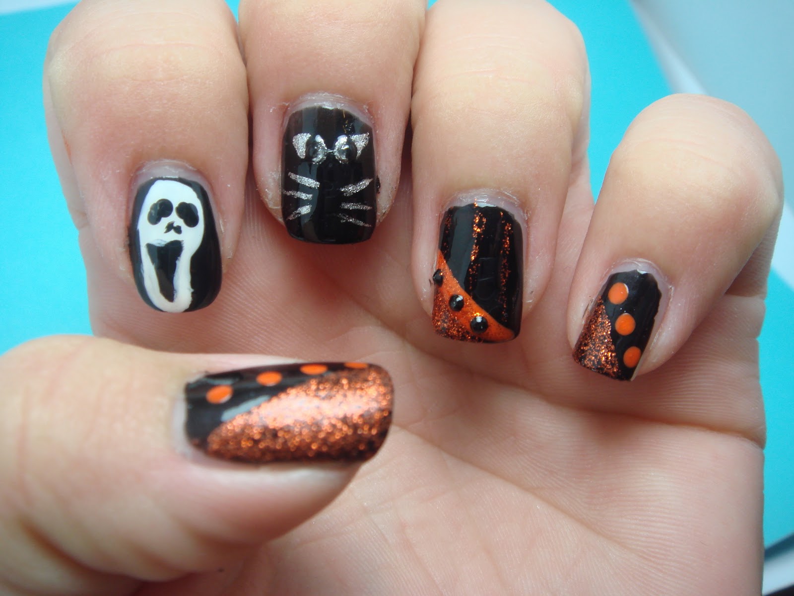 3. "Black and Orange Bat Nail Design for Halloween" - wide 4