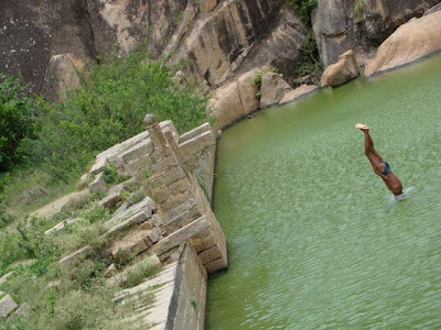 old man Diving into the pool