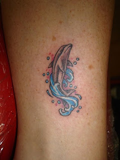 Dolphin Tattoos Design hand