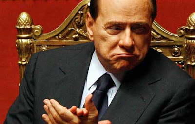 http://3.bp.blogspot.com/_zmVvFGUP9lk/TQi0m7PzYaI/AAAAAAAAAWc/BeejB2s4_eE/s400/Berlusconi+Smirking.jpg