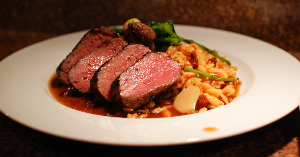 Abby & Sam's Kitchen Sousvide lamb loin with lamb jus, toasted orzo