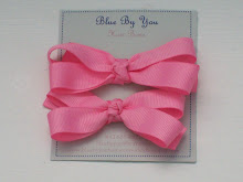 3 " bow made with 3/4" Light Pink grosgrain ribbon
