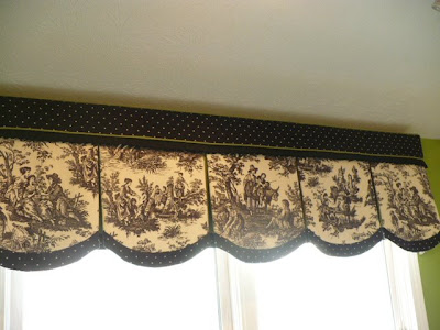 black and cream curtains. These are my kitchen curtains. They're a fun combination of black and cream 
