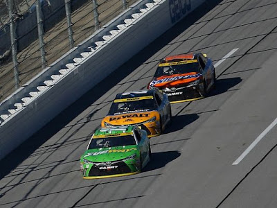 Joe Gibbs Racing teammates Carl Edwards, Matt Kenseth and Kyle Busch purposely trailed the field for most of the day at Talladega Superspeedway. (Photo: Sarah Crabill, Getty Images)