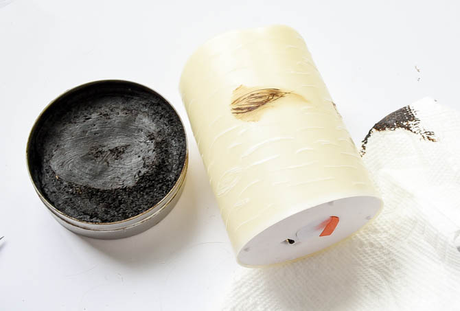 Apply antique wax into slits of candle 