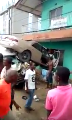 Photos/Video: Car rams into residential building in a freak accident at Yaba
