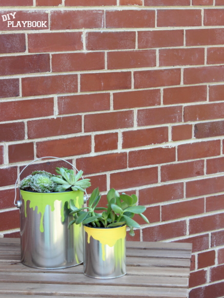 This easy paint can planter is a perfect father's day gift. 