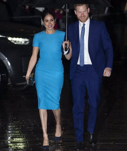 Meghan Markle wore Victoria Beckham pencil midi dress. Meghan, Duchess of Sussex and Prince Harry, Duke of Sussex