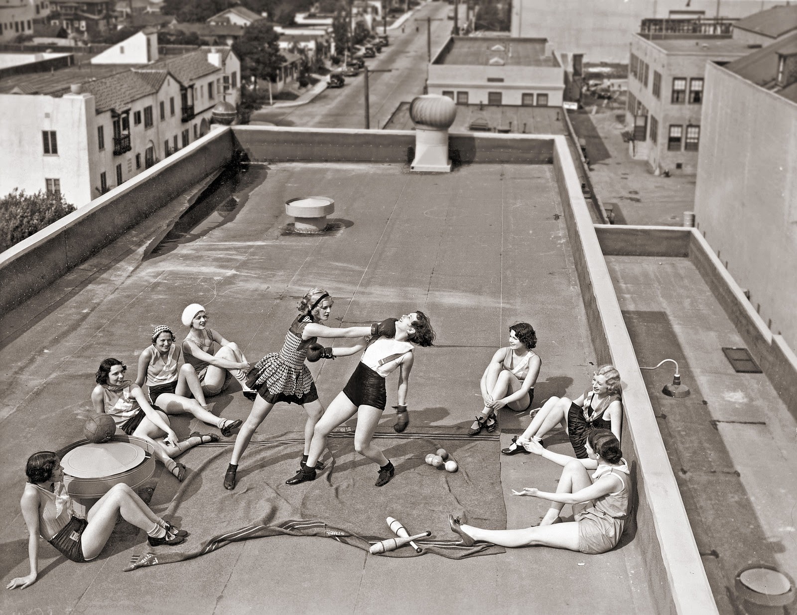 Women boxing on a roof  1938 - 49