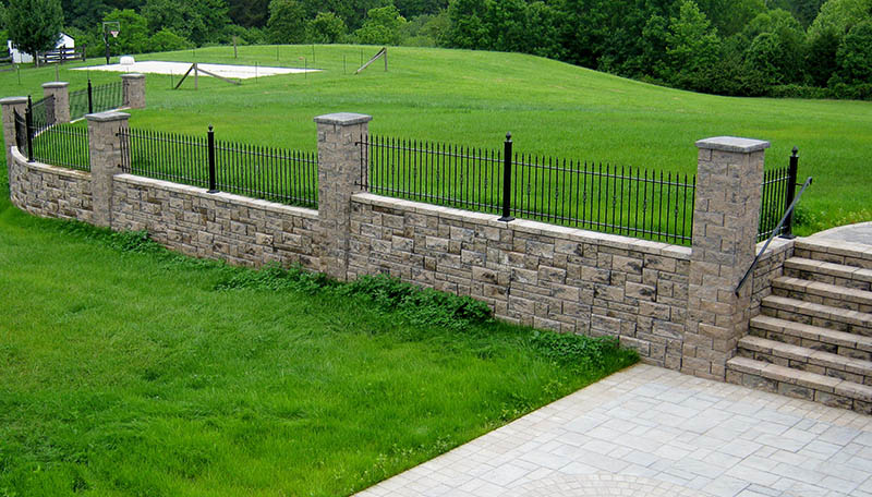 The Allan Block Blog Can I Build With A Patio Wall On Uneven Ground Patio Wall On Uneven Ground, Build A Brick Patio On Uneven Ground