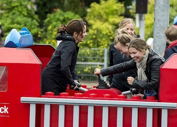 Crown Prince Frederik, Crown Princess Mary, Prince Christian, Princess Isabella, Prince Vincent and Princess Josephine visited Legoland. Style royal princess mary wore dress