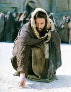 Jesús escribiendo en tierra frente a la mujer adúltera