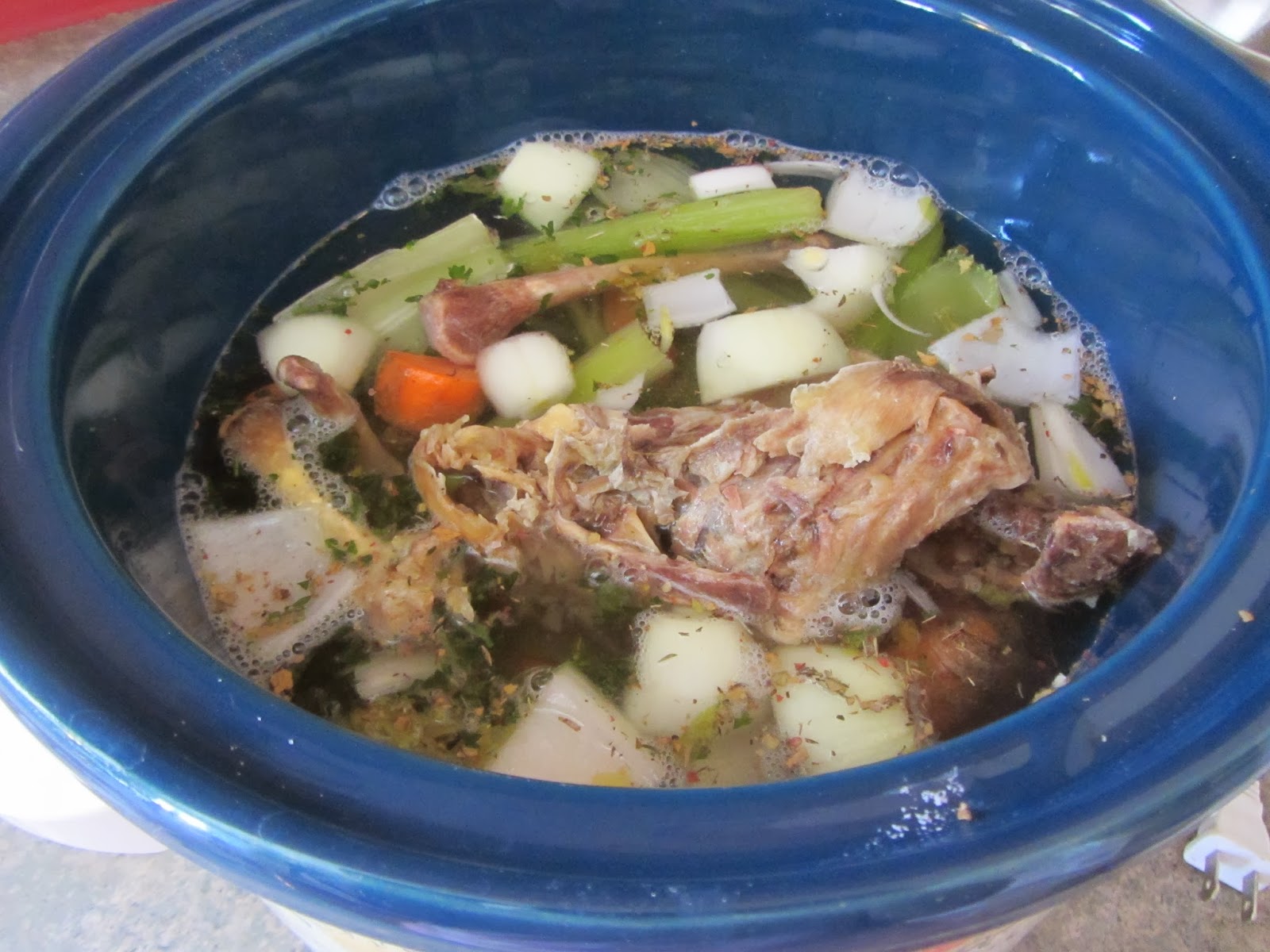 The Unlikely Homeschool Slow Cooker Chicken Stock from Kitchen Scraps