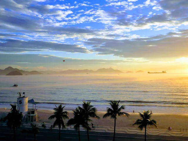 Awesome Activities in Rio de Janeiro Brazil: Watch the sunrise over Copacabana Beach