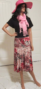 Ladies Animal Print Full Circle skirt in shades of red, black, and pink.