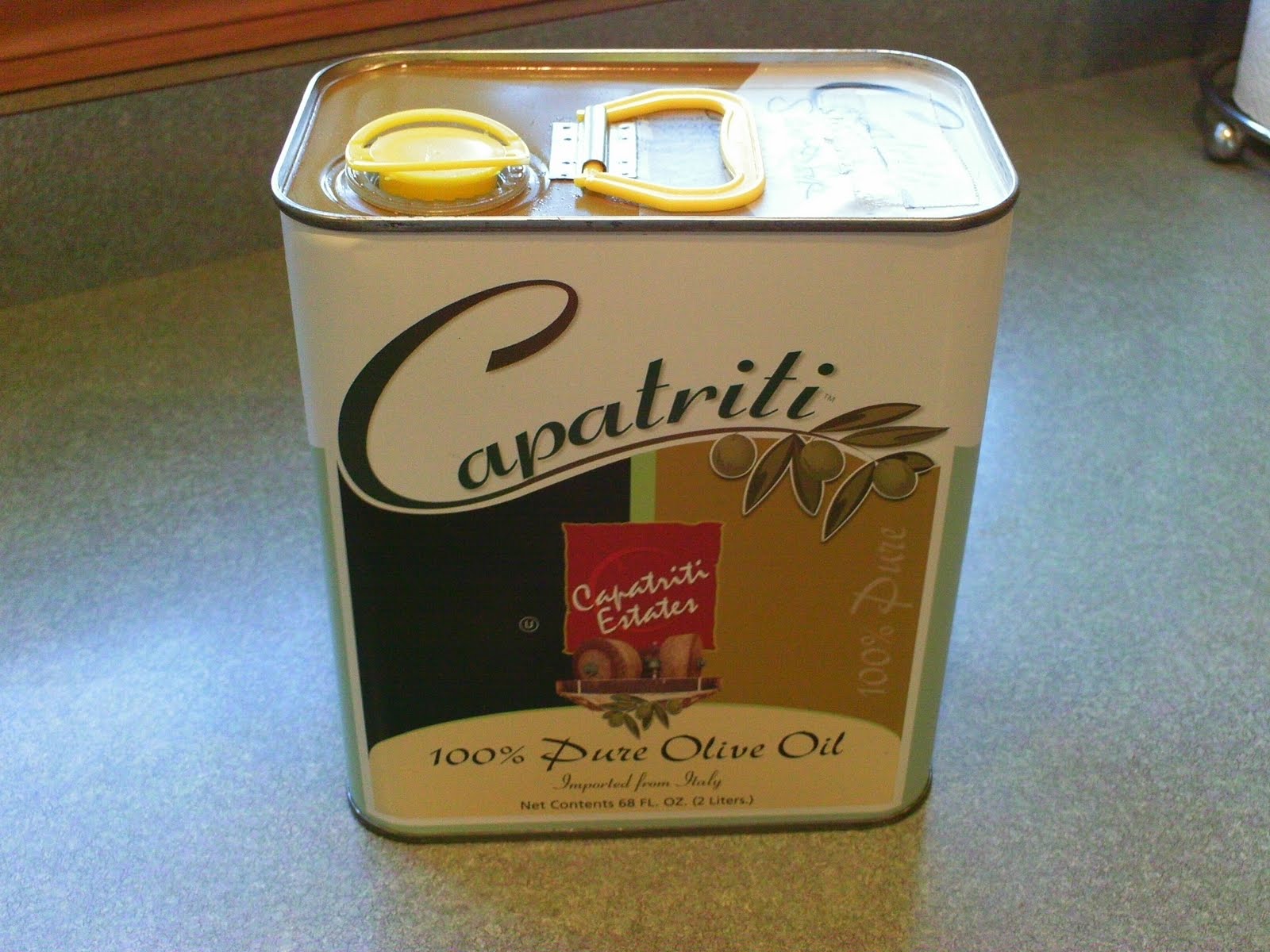 Danielle's Heartfelt Home Olive Oil Can Arrangement