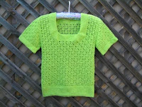 "Petal Pullover" crocheted in green.