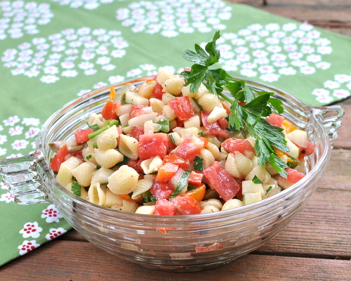 Greek Pasta Salad with Creamy Feta Vinaigrette, another classic summer salad ♥ KitchenParade.com, loaded with vegetables in a tangy-creamy feta vinaigrette.