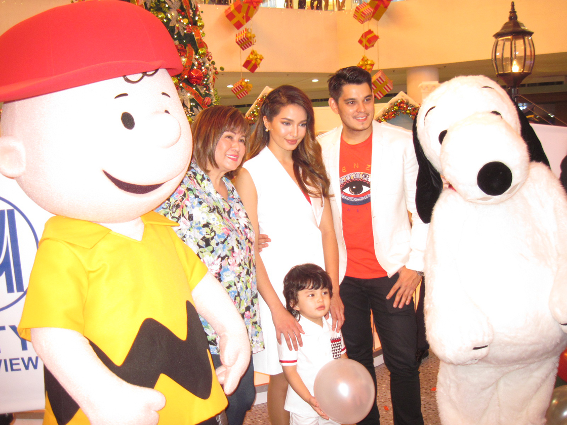 Gutierrez family with Snoopy and Charlie Brown at SM Fairview
