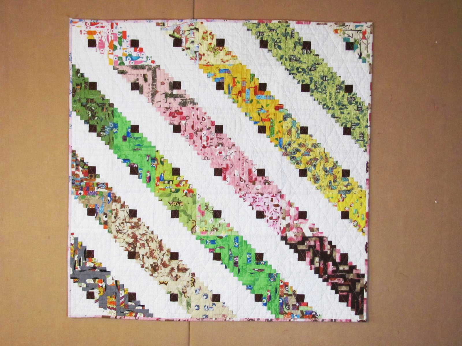 Inklingo Projects Log Cabin Baby Quilt for a Girl