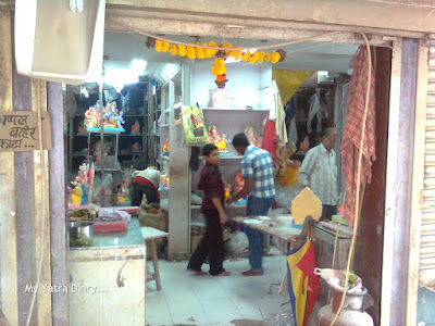 The Ganpati idols being stacked up beautifully in shops to be taken by devotees to homes and pandals