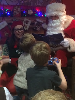 Children meet Santa Claus Father Christmas