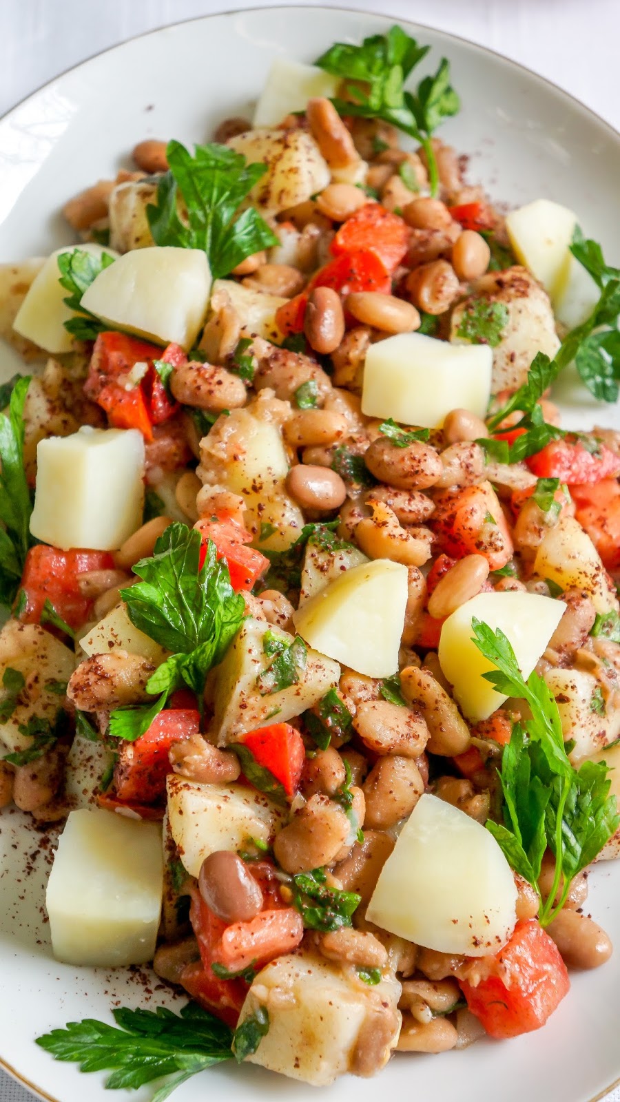 Potato salad with pinto beans and tomatoes