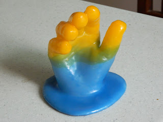 Colorful wax impression of hand