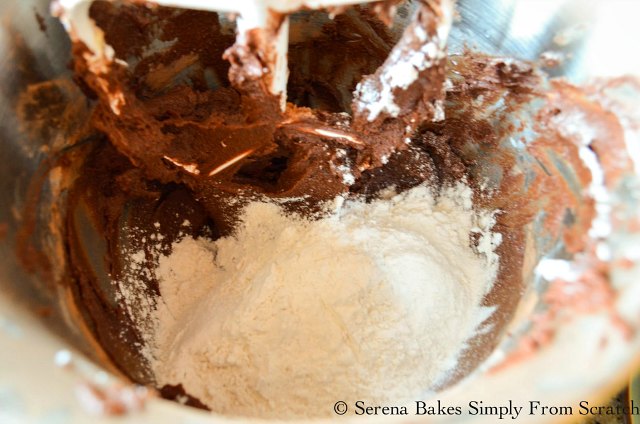 Triple Chocolate Hazelnut Cookies stir in flour from Serena Bakes Simply From Scratch.