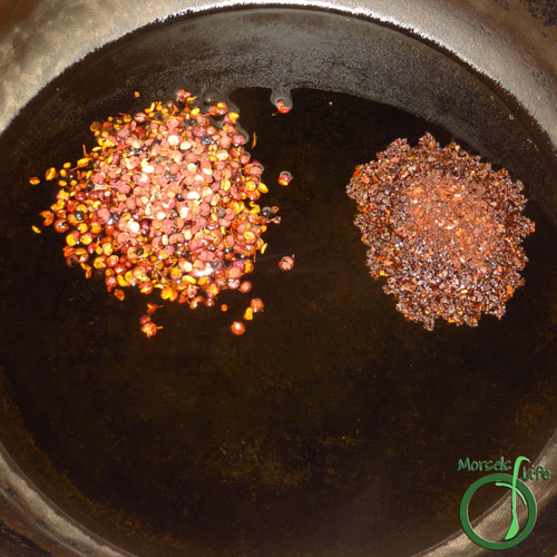 Morsels of Life - MaPo Tofu Step 2 - Heat Sichuan peppercorns and chili pepper flakes in oil until fragrant.