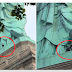 Woman spotted climbing the statue of liberty (Video)