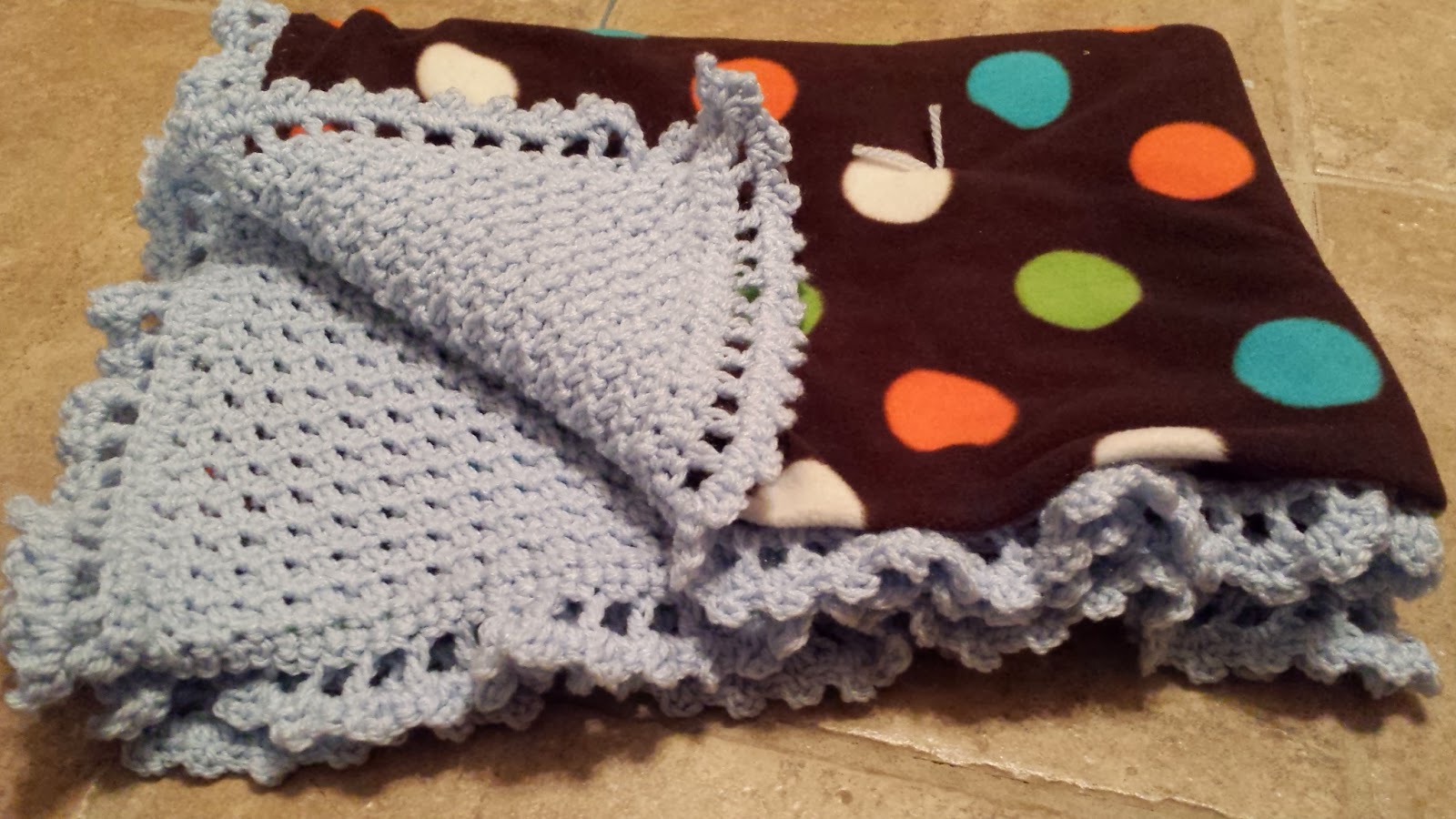 One Craft Short of Crazy Awesome reversible crocheted blanket!