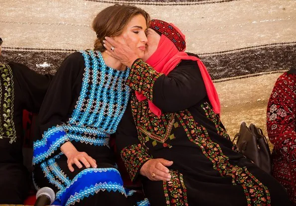 Queen Rania's most stylish moments. Basmet Al-Khair Charitable Society for traditional Jordanian spring dressing