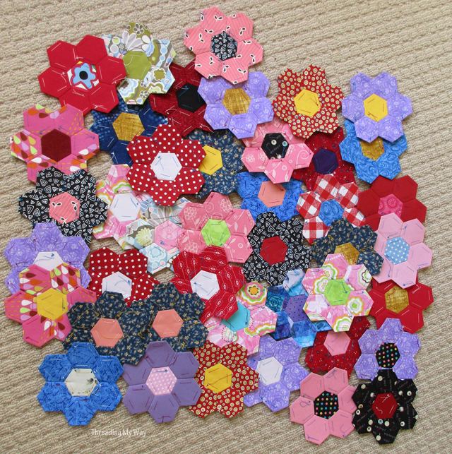 Turning hexies into flowers ready for a quilt ~ Threading My Way