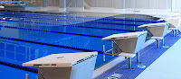 A picture from the local aquatic center's webpage, the lap pool with the starting blocks shown