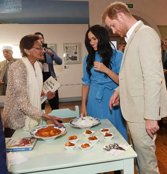 Meghan Markle wore Veronica Beard Sky Blue Cara dress. Duchess is in the same dress she wore on tour in Tonga