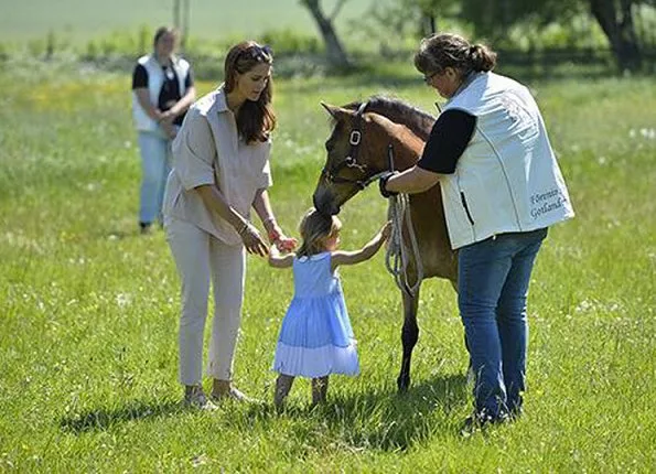 Swedish Princess Madeleine and Prince Nicolas. Princess Leonore met Heidi the foal who was a christening gift at Gotland