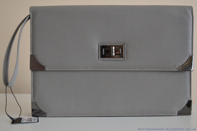 a picture of a grey clutch from primark