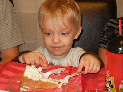 boy eating cheesecake 