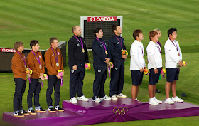 Galiazzo (centre) on the podium after winning the team gold medal at the 2012 London Olympics