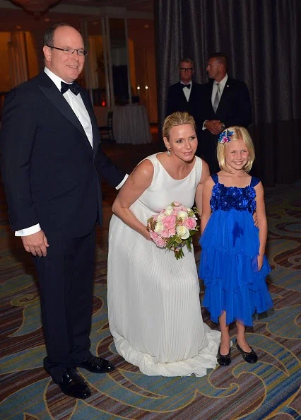 (L-R) Ballet dancer David Hallberg, Princess Charlene of Monaco and Prince Albert II of Monaco attend the 2014 Princess Grace Awards Gala with presenting sponsor Christian Dior Couture at the Beverly Wilshire Four Seasons Hotel, 08.10.2014.