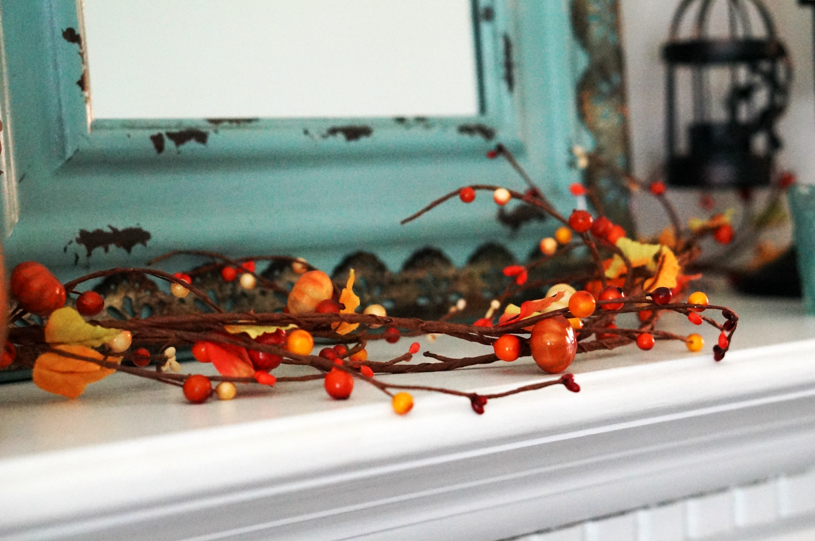 Rebecca Lately Fall Decor 2016 Fall Mantel in Orange Turquoise Bronze Mirror Garland Leaves Large Mantel