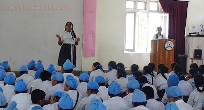 A student expressing her views during English Declamation Contest at Guru Nanak International Public School