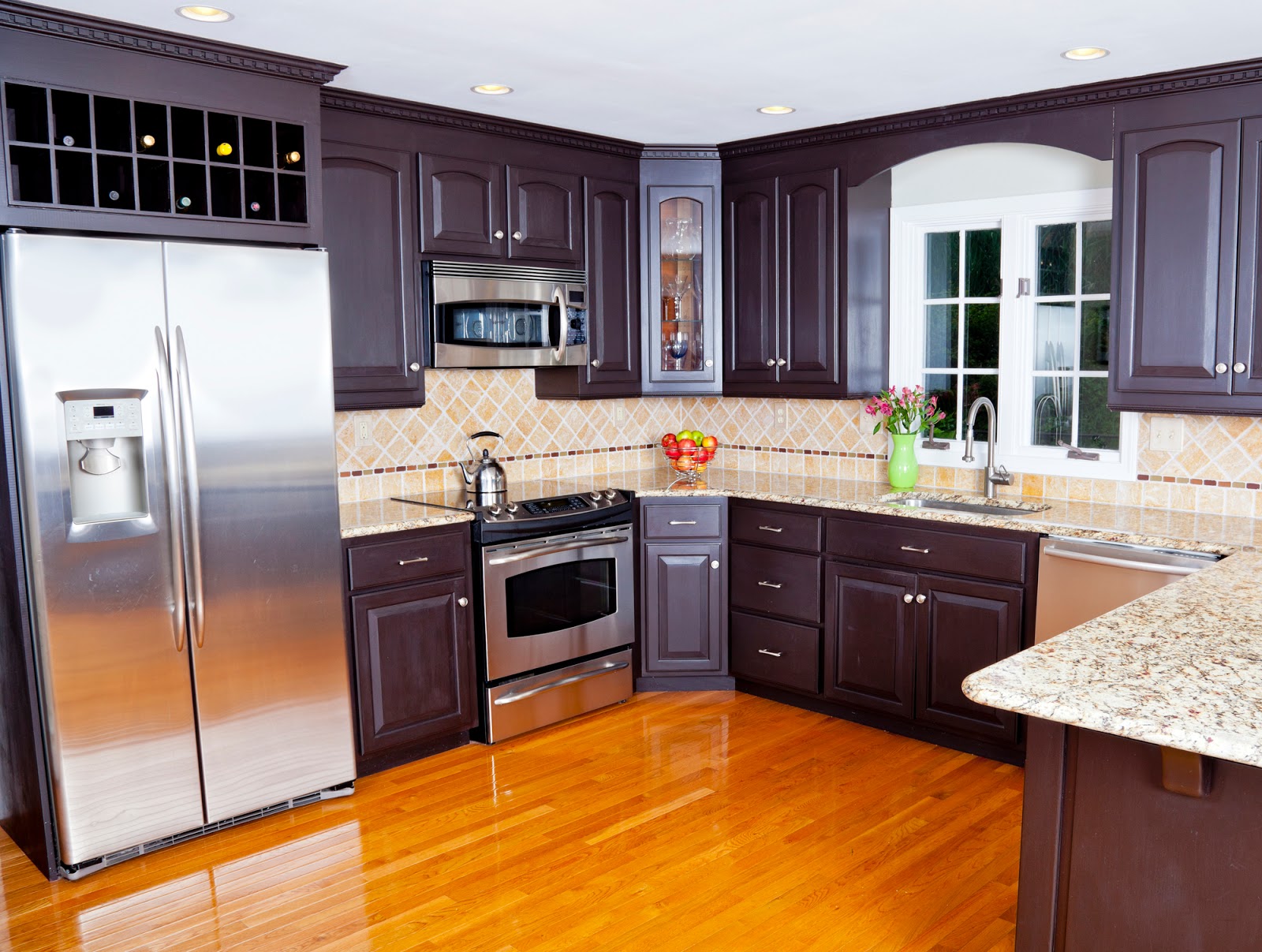 Put down that brush: Eight reasons to not paint cabinets ...
