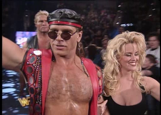WWF / WWE: Wrestlemania 11 - Shawn Michaels was accompanied to the ring for his WWF title match by Sid and MTV's Jenny McCartney WWF / WWE: Wrestlemania 11 - Shawn Michaels was accompanied to the ring for his WWF title match by Sid and MTV's Jenny McCartney