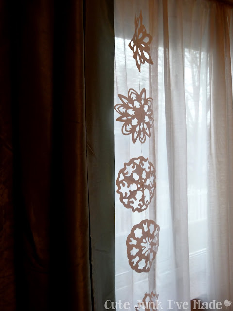 Paper Snowflake Curtain Tutorial - First Strand Hung Up