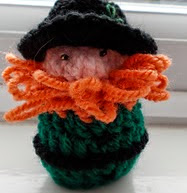 http://www.ravelry.com/patterns/library/leprechaun-chocolate-cover-decoration